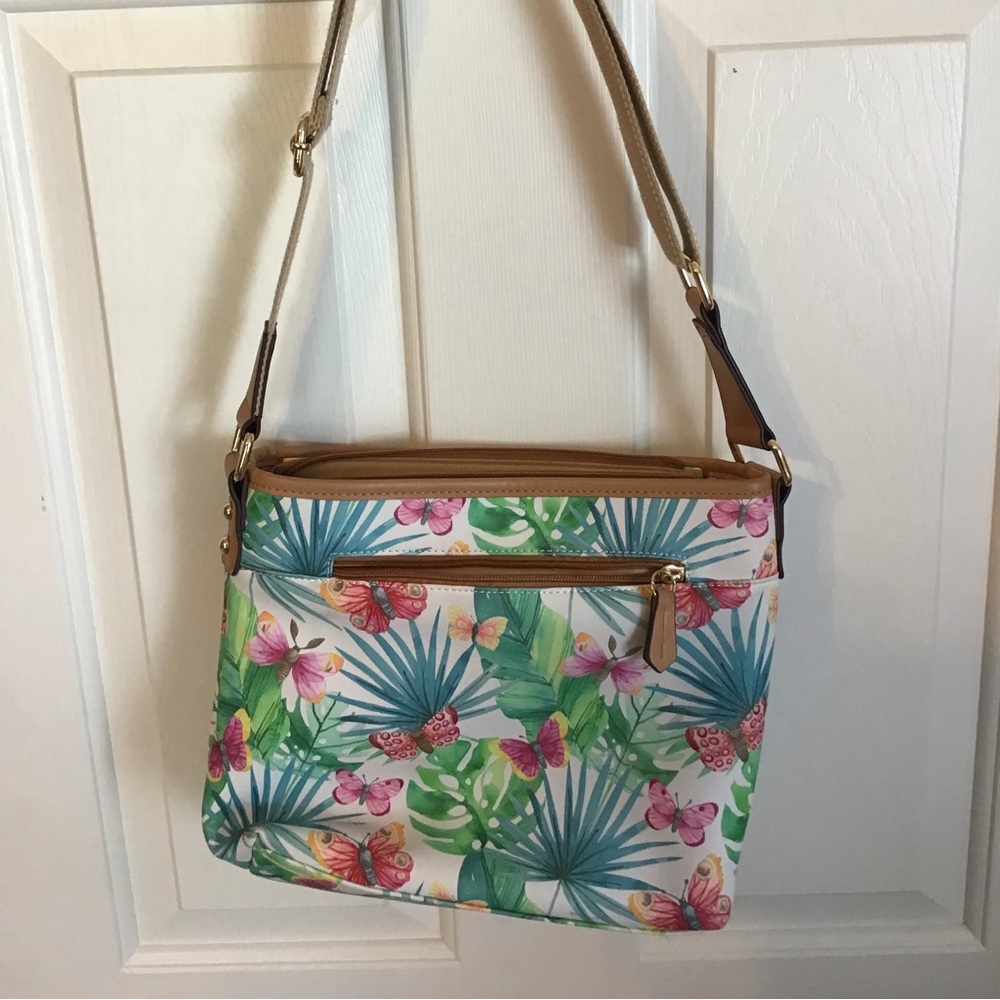 Multi colored bag. 12”wide 9”tall. Deleting item today. Last chance to purchase